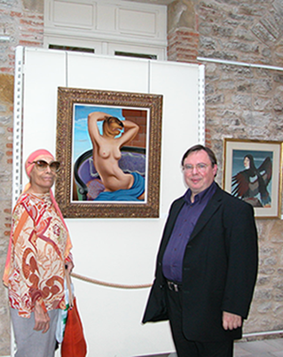 Avec Jean Binder devant « Le bonheur d’être aimée » lors du vernissage de l’exposition Labisse à Cordes sur Ciel en 2005.